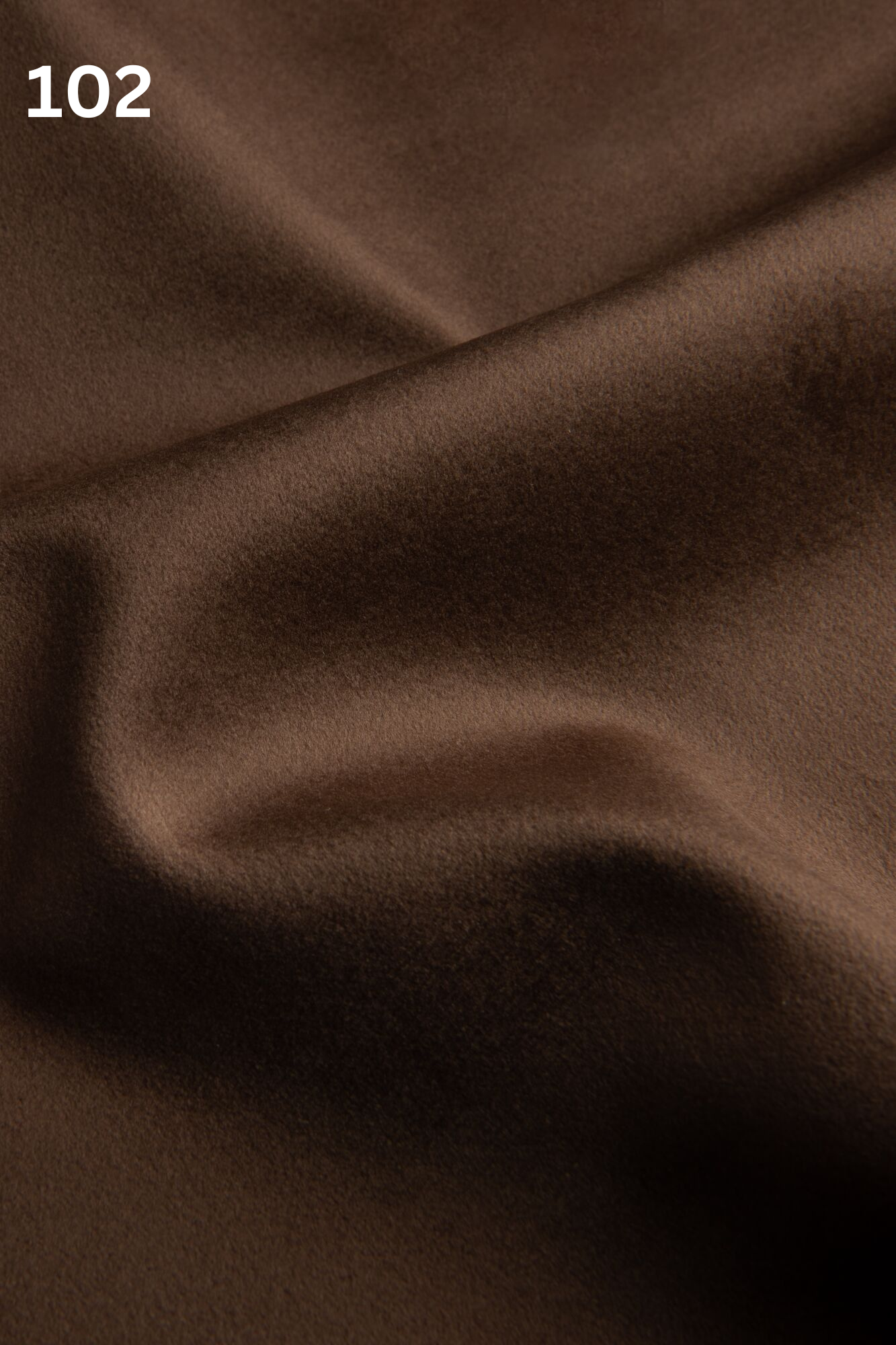 Luxurious Quartz knitted warp velvet fabric with ultra-fine high pile, matte finish, and soft texture, inspired by the elegance of the gemstone.