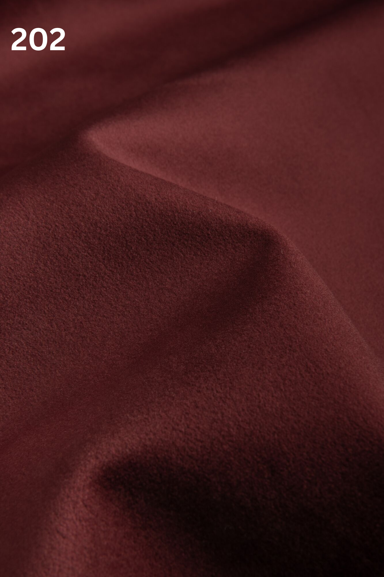 Luxurious Quartz knitted warp velvet fabric with ultra-fine high pile, matte finish, and soft texture, inspired by the elegance of the gemstone.