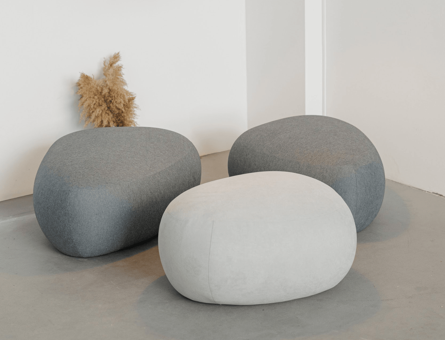 Multifunctional pouf in premium custom choice fabric – stylish and practical.