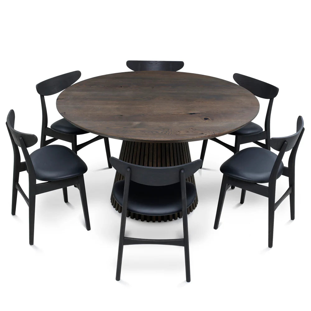 Round extendable solid wood dining table with wood pipe legs in dark oak.