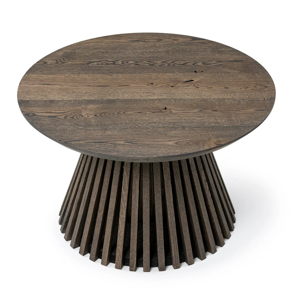 Capella Solid Wood Round Coffee Table in Dark Charcoal Oak with a sleek wood grain finish and a sturdy pipe-cone shaped leg for a modern, stylish look.