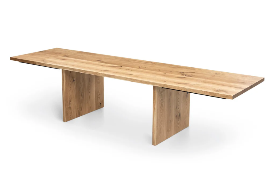 Luxury oak dining table with wood plate legs – perfect for modern interiors with a vibe of rustic style.