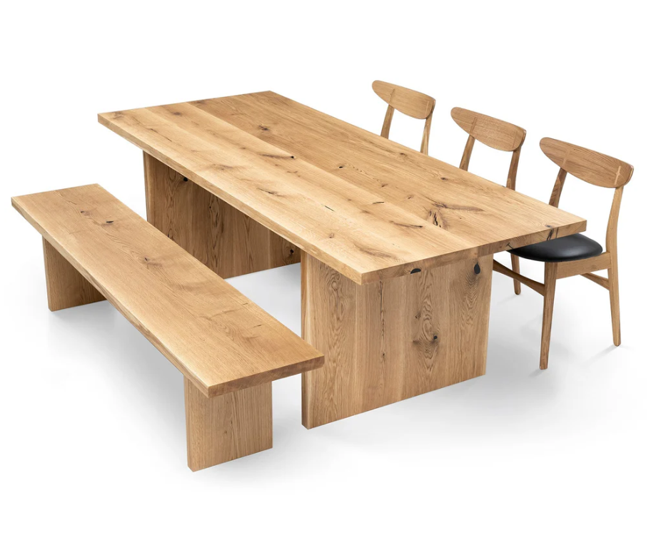 Luxury oak dining table with wood plate legs – perfect for modern interiors with a vibe of rustic style.