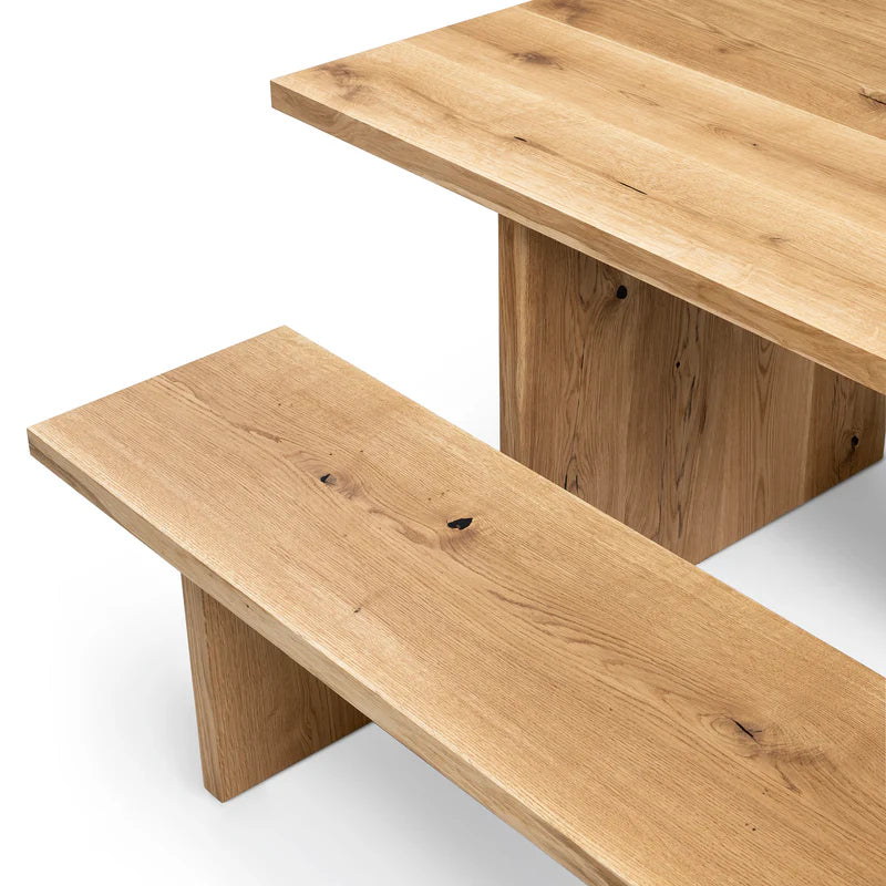 Luxury oak dining table with wood plate legs – perfect for modern interiors with a vibe of rustic style.