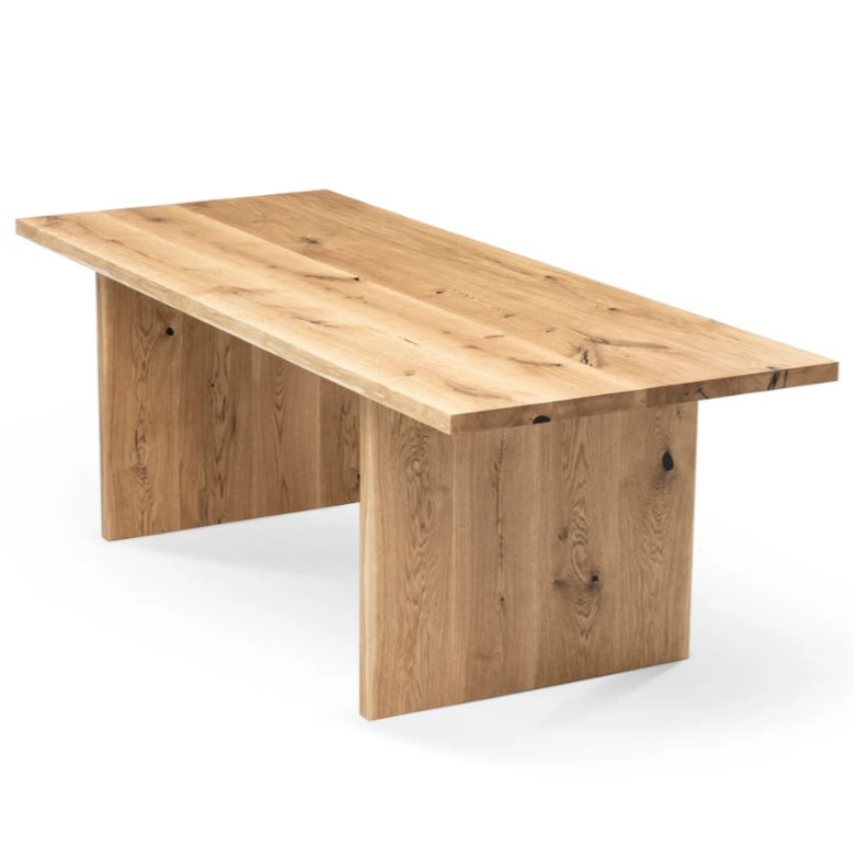 Luxury oak dining table with wood plate legs – perfect for modern interiors with a vibe of rustic style.