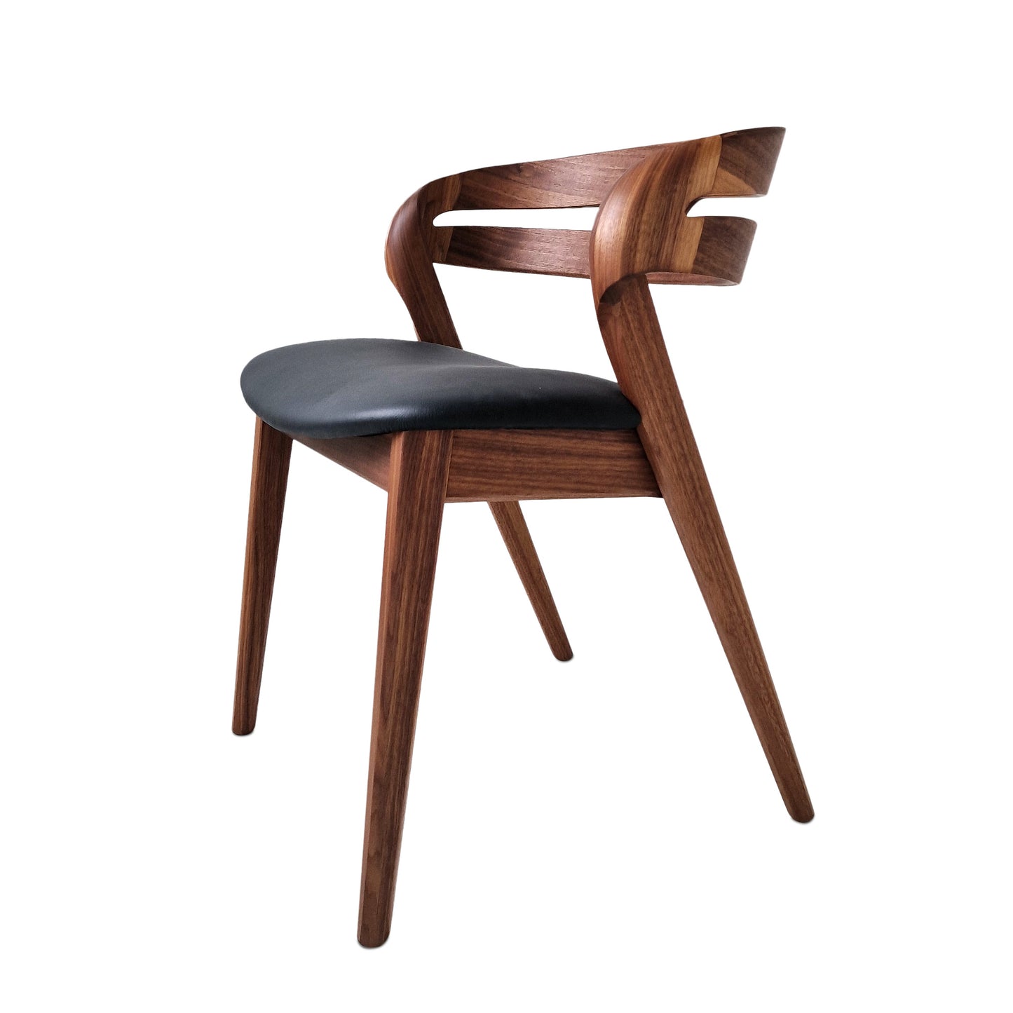 Solid walnut and natural leather curved dining chairs - style and high quality.