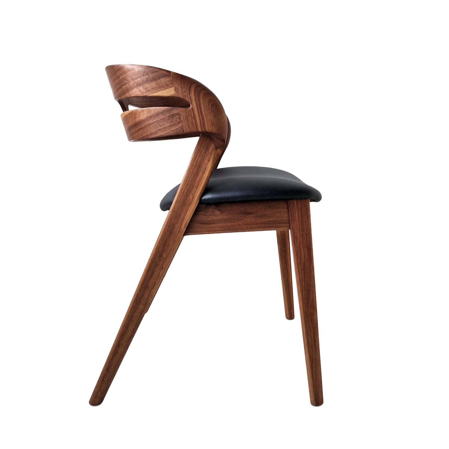 Solid walnut and natural leather curved dining chairs - style and high quality.