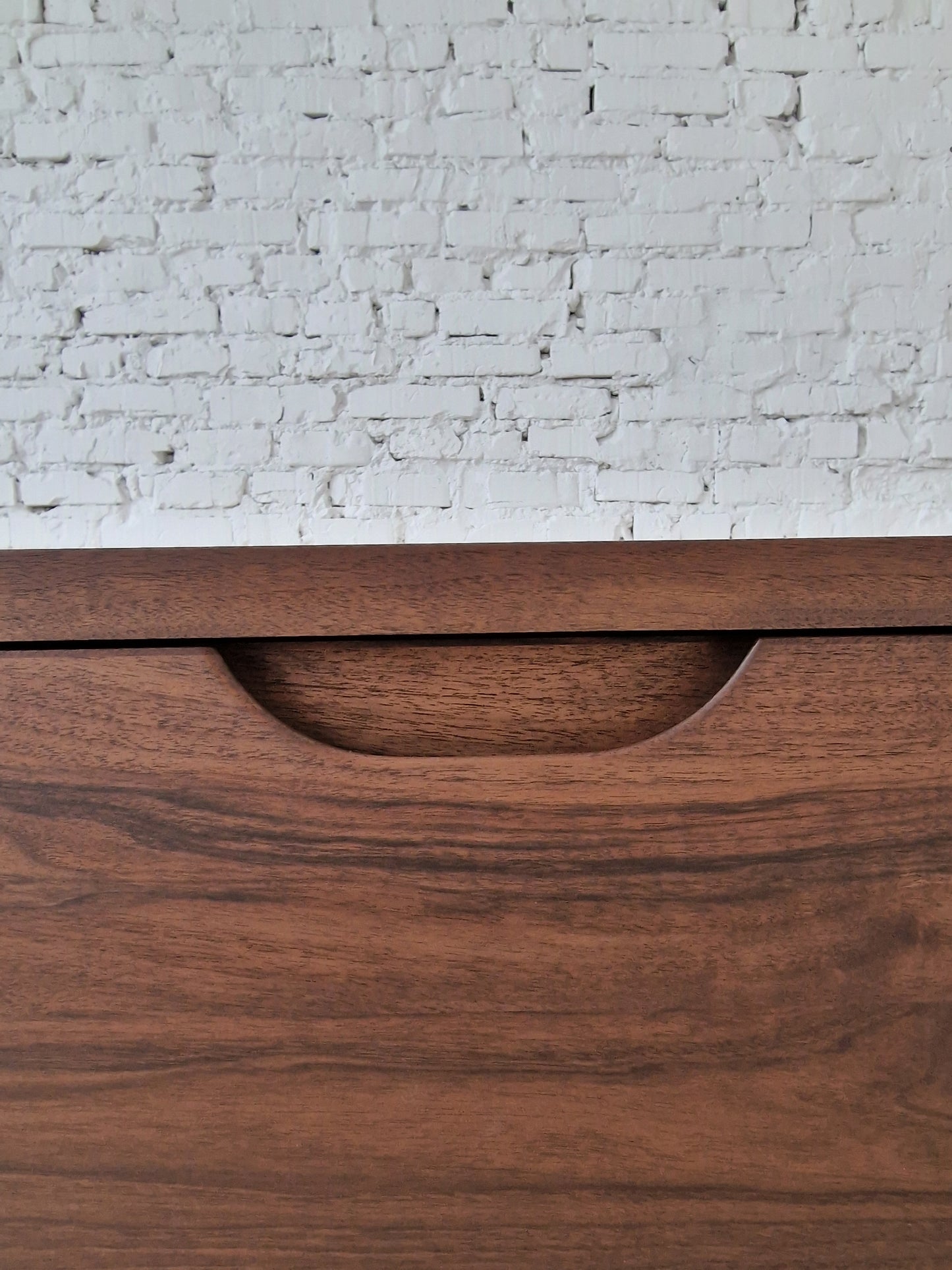 Elegant solid walnut sideboard buffet with ample storage, featuring a modern design, smooth wood grain, and soft-close doors—perfect for dining or living rooms.
