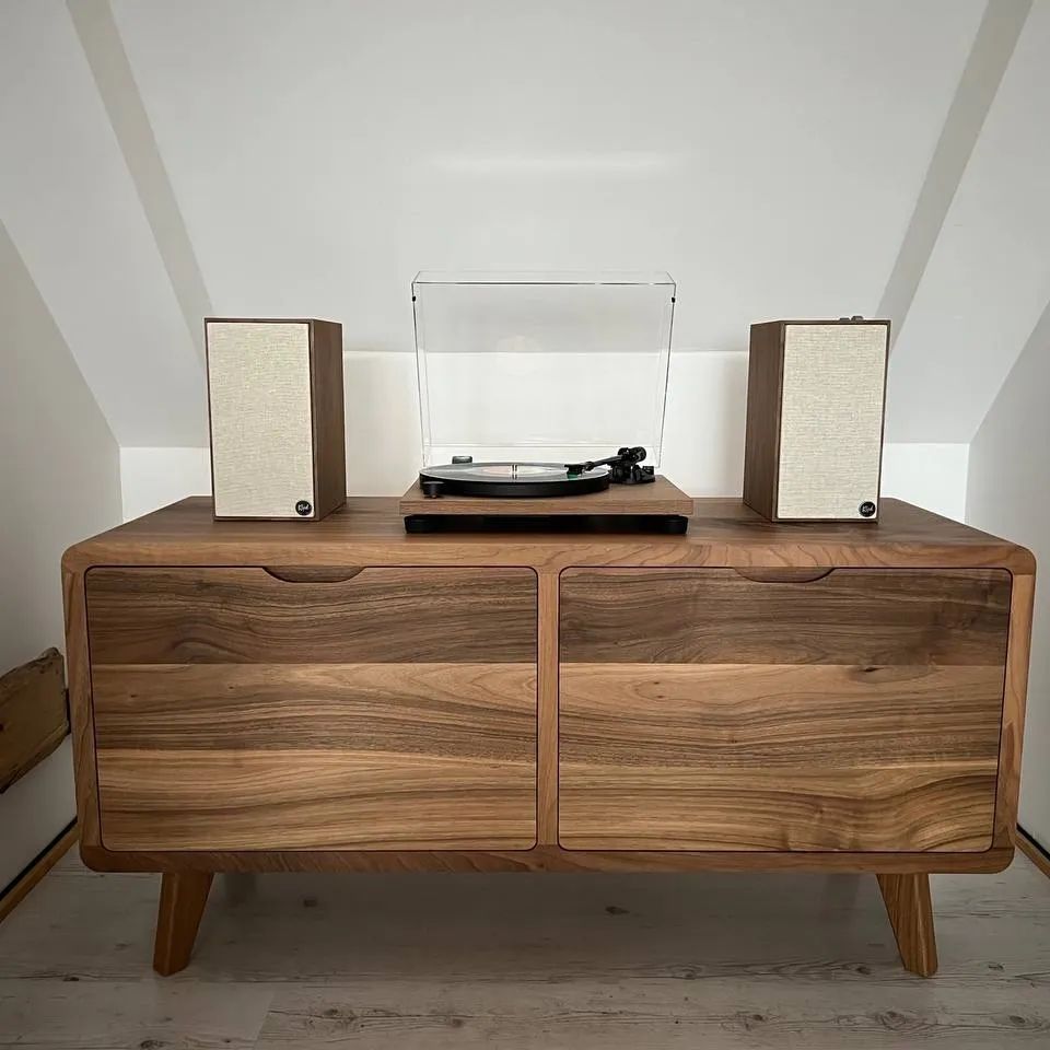 Elegant solid walnut sideboard buffet with ample storage, featuring a modern design, smooth wood grain, and soft-close doors—perfect for dining or living rooms.
