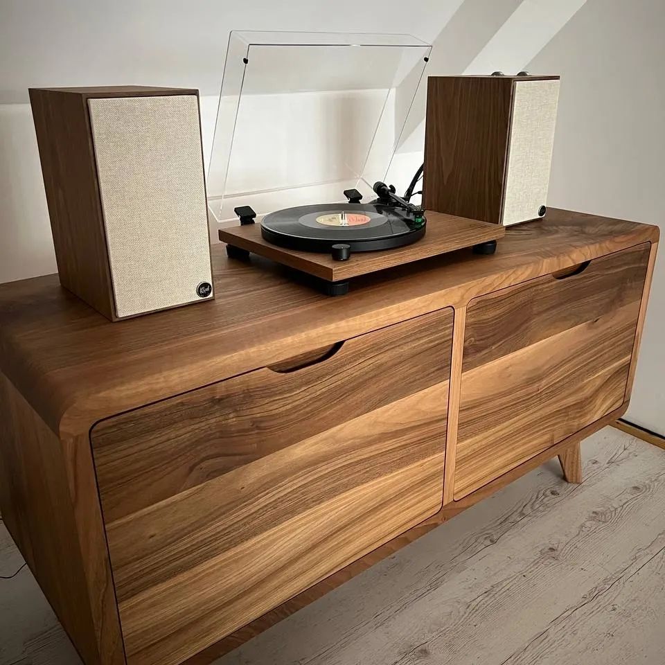 Elegant solid walnut sideboard buffet with ample storage, featuring a modern design, smooth wood grain, and soft-close doors—perfect for dining or living rooms.