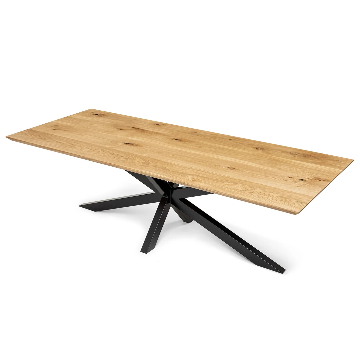 Solid wood dining table in natural oak with a modern metal spider leg base.