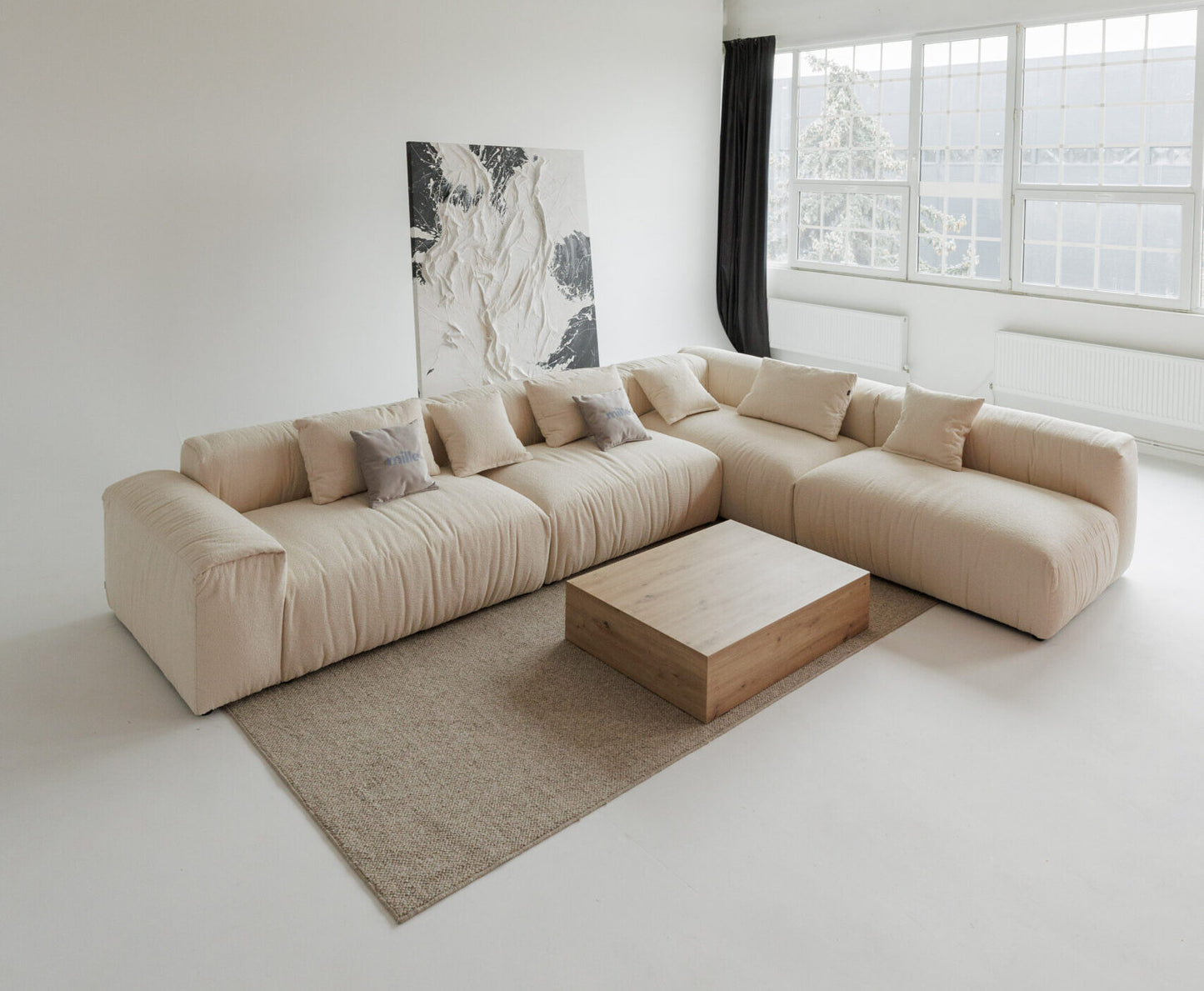 Deep-seated sectional sofa with oversized cushions – perfect for lounging.