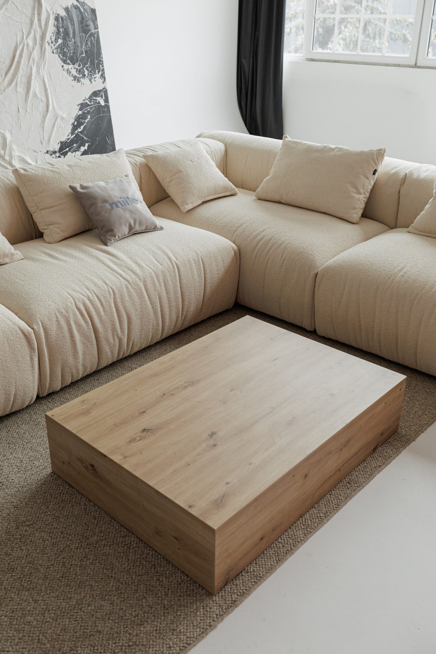 Deep-seated sectional sofa with oversized cushions – perfect for lounging.