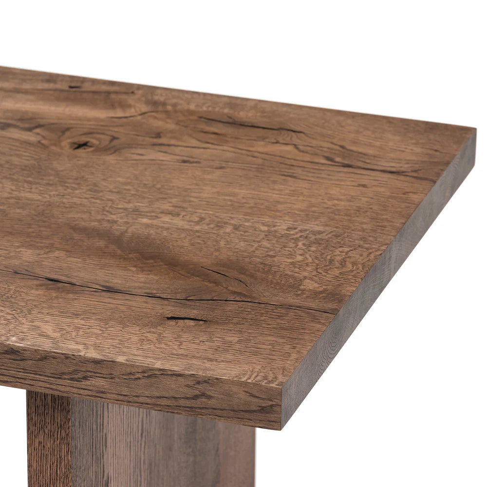 Megan solid wood coffee table in chocolate oak finish, showcasing timeless design and handcrafted from FSC-certified oak for durability and style. Its rich wood grain, sleek lines, and robust construction make it a versatile, sustainable centerpiece for modern and classic interiors.