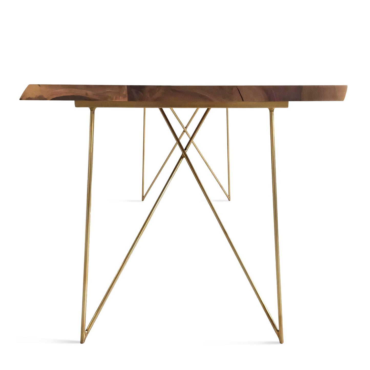 Close-up view of the Rhea solid wood dining table in oak or walnut with golden metal legs, featuring live or corner edge detailing.