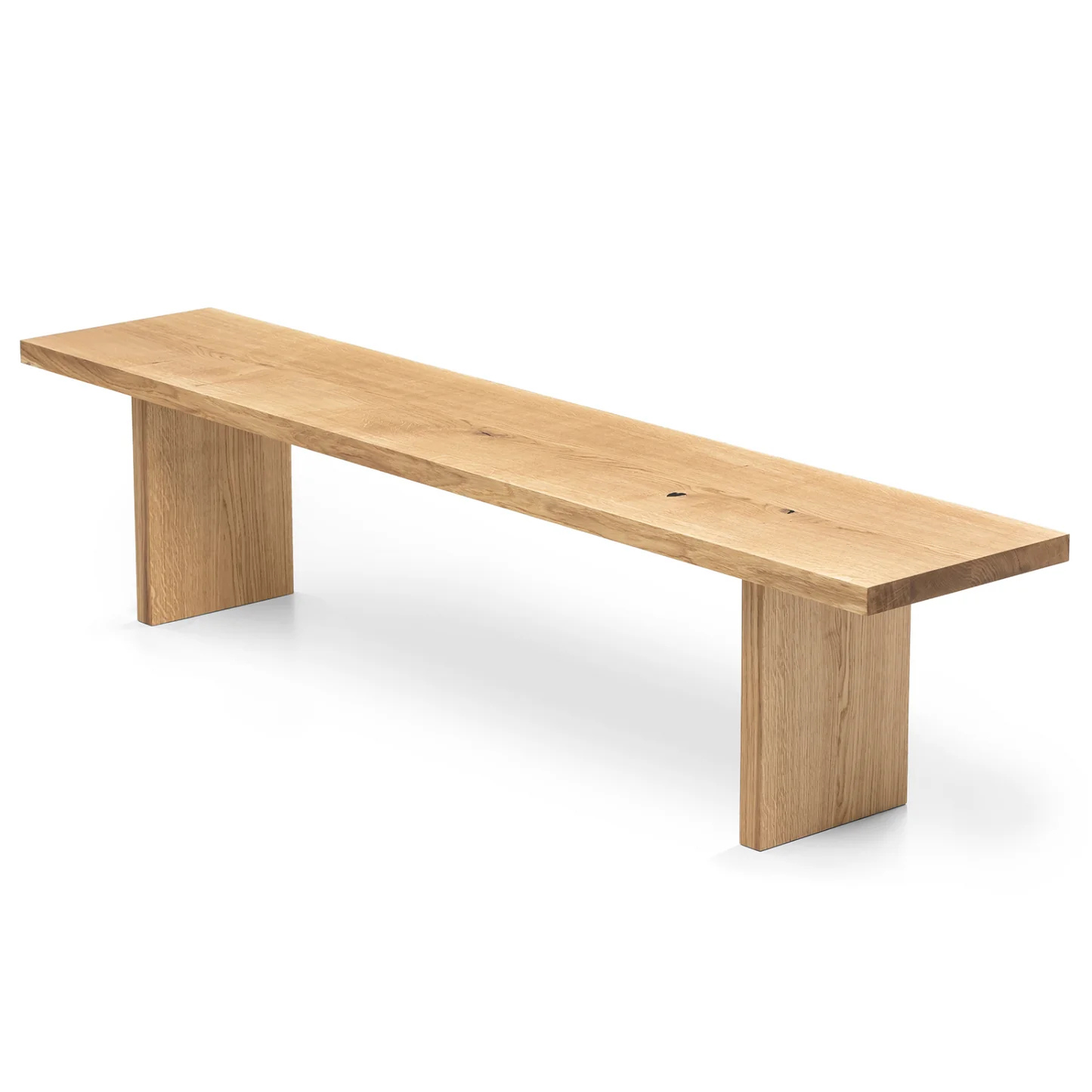 Handcrafted solid wood dining bench in natural oak with wooden legs.