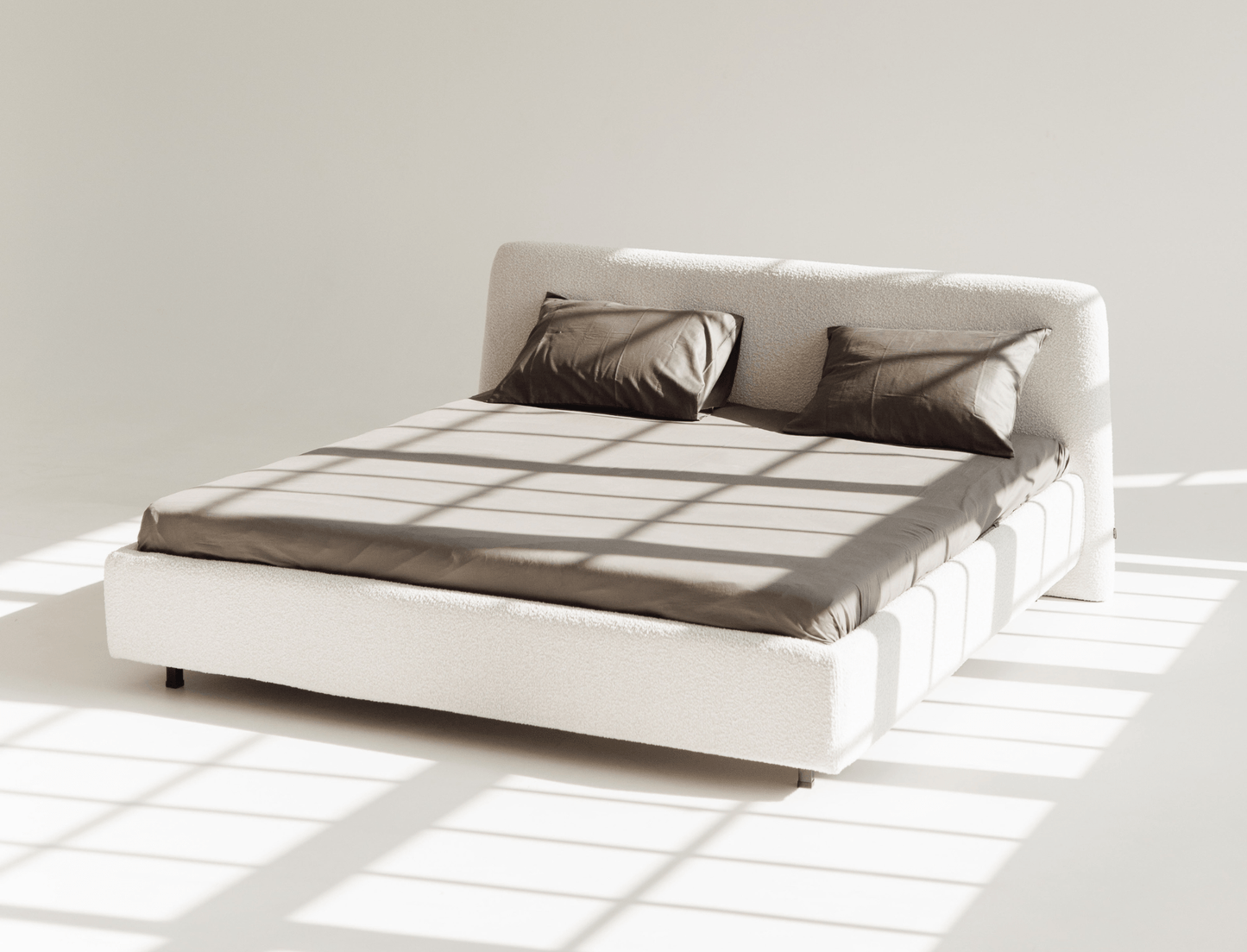 Luxury upholstered bed with tufted headboard – perfect for contemporary homes.