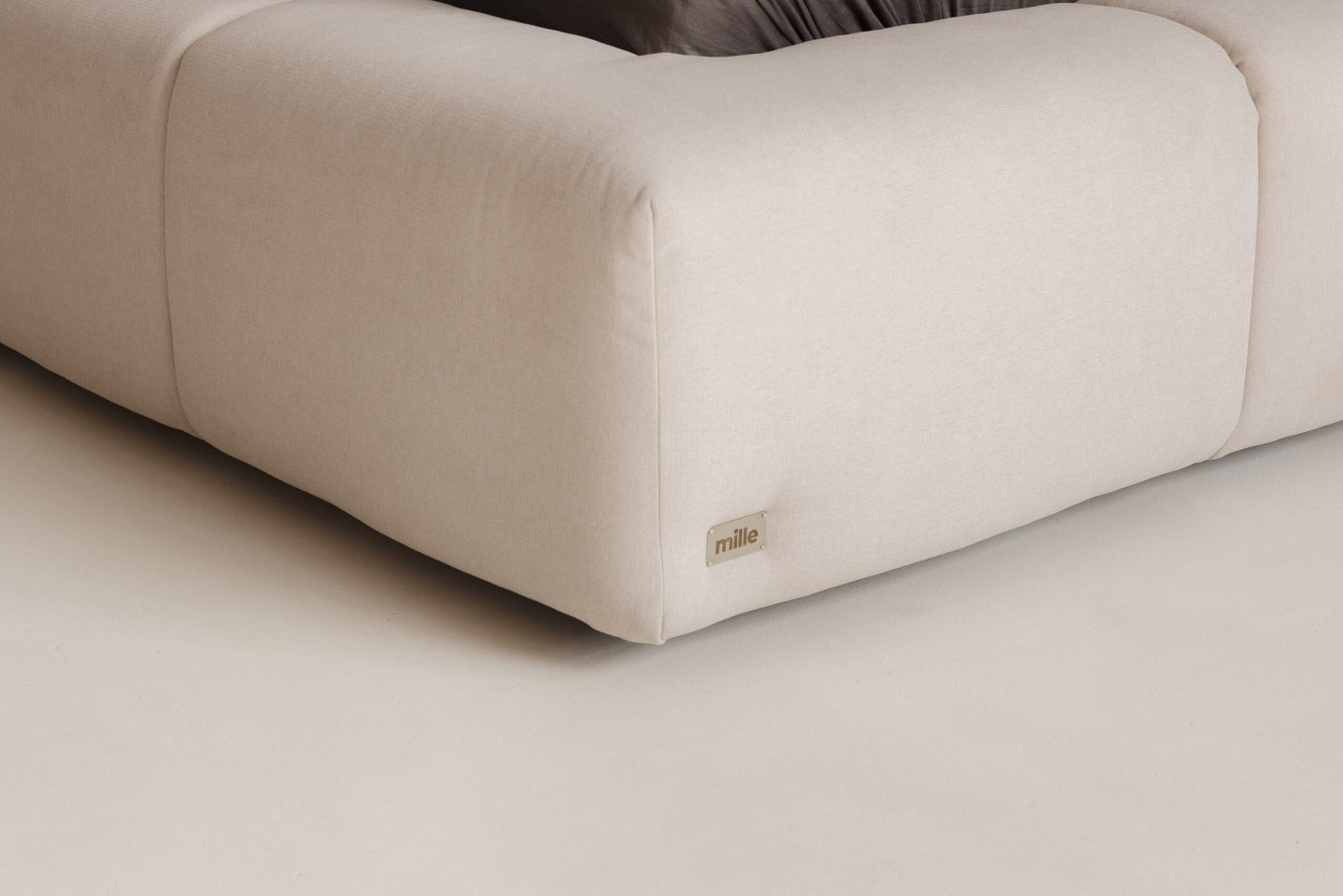 Elegant upholstered bed with deep tufted headboard – timeless luxury for your bedroom.