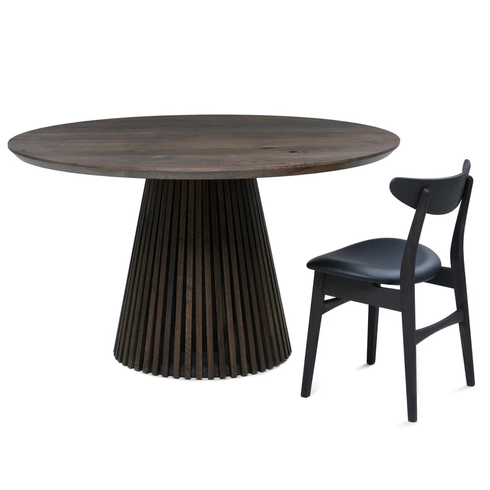 Round extendable solid wood dining table with wood pipe legs in dark oak.