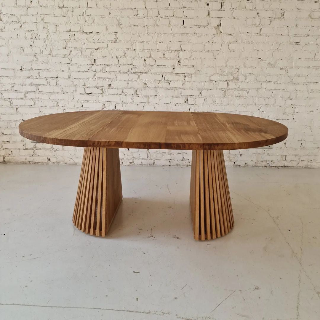 Custom round dining table, extendable and expandable, solid FSC oak with pipe leg base, sustainable, handmade furniture delivered across Europe.