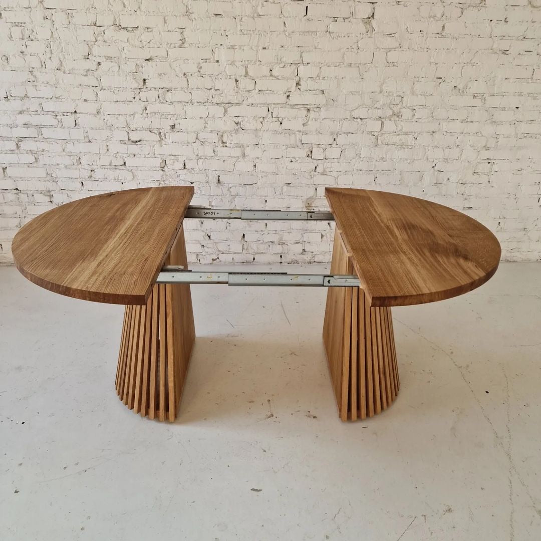 Custom round dining table, extendable and expandable, solid FSC oak with pipe leg base, sustainable, handmade furniture delivered across Europe.