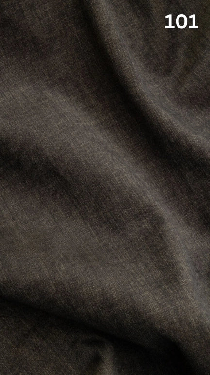Close-up of black velvet fabric texture with a slight pattern and number '101' in the corner. 