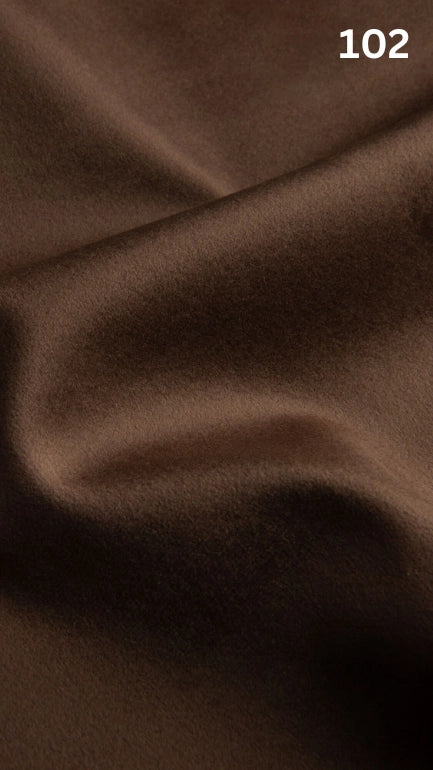 Premium velvet fabric for sofas in brown with a number '102' in the corner. 