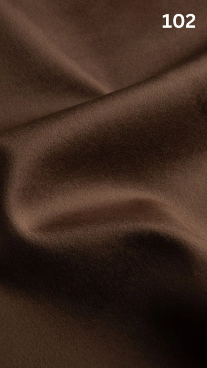 Premium velvet fabric for sofas in brown with a number '102' in the corner. 