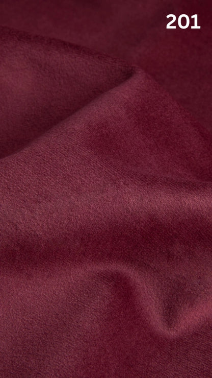 Premium velvet fabric for sofas in pink with a number '201' in the corner. 