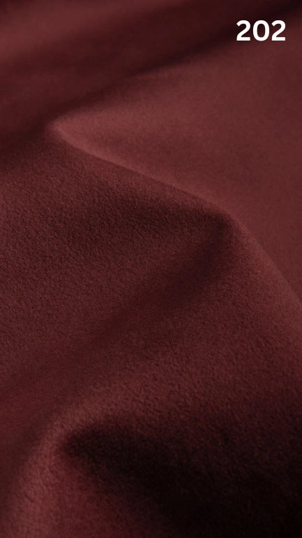 Premium velvet fabric for sofas in red with a number '202' in the corner. 