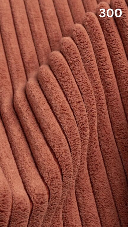 Close-up of orange textured premium corduroy fabric for sofas with a number '300' in the corner. 