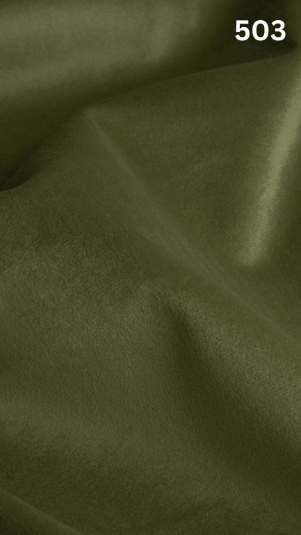 Premium velvet fabric for sofas in green with a number '503' in the corner. 
