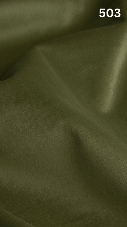 Premium velvet fabric for sofas in green with a number '503' in the corner. 