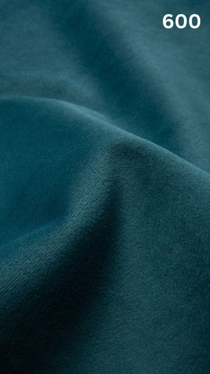 Premium velvet fabric for sofas in blue with a number '600' in the corner. 