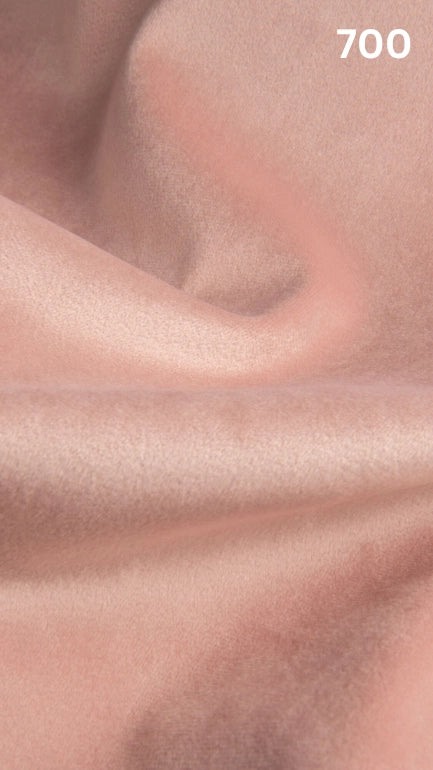 Premium velvet fabric for sofas in pink with a number '700' in the corner. 
