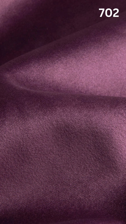 Premium velvet fabric for sofas in purple with a number '702' in the corner. 