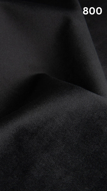 Premium velvet fabric for sofas in black with a number '800' in the corner. 