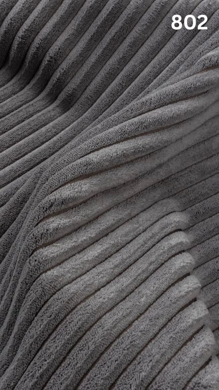Close-up of gray textured premium corduroy fabric for sofas with a number '802' in the corner. 