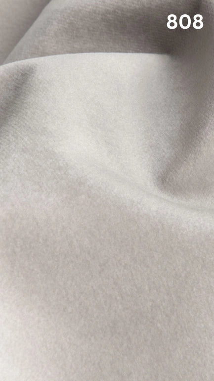 Premium velvet fabric for sofas in white with a number '808' in the corner. 