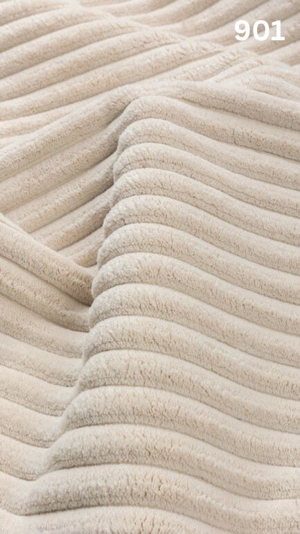 Close-up of cream textured premium corduroy fabric for sofas with a number '901' in the corner. 
