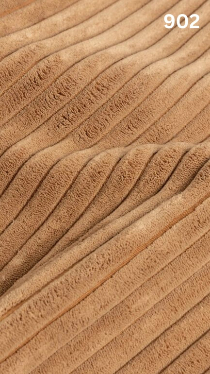 Close-up of yellow textured premium corduroy fabric for sofas with a number '902' in the corner. 