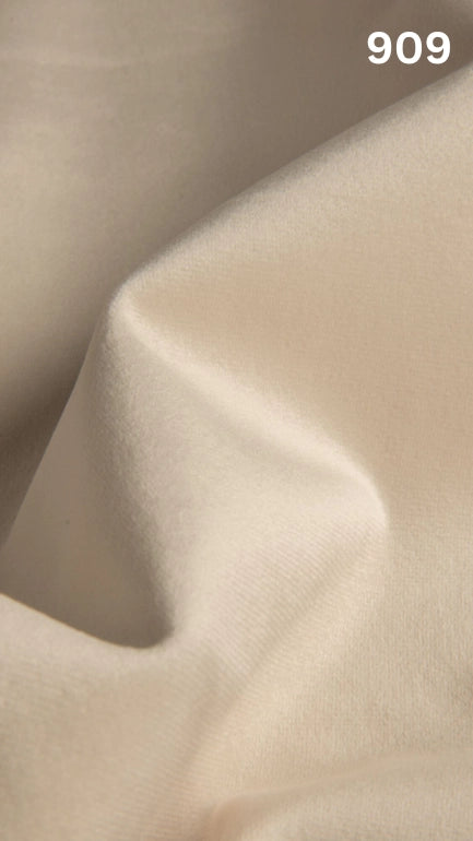 Premium velvet fabric for sofas in cream with a number '909' in the corner. 