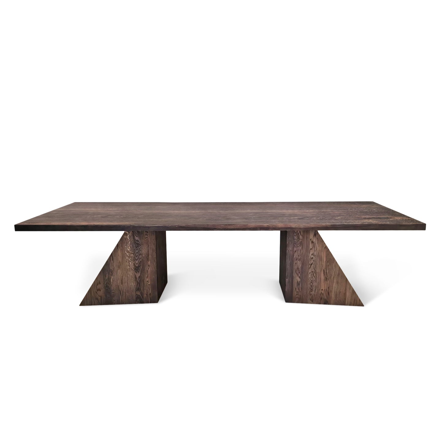 Neph bespoke dining table in chocolate oak, handcrafted from FSC certified solid wood planks. This premium, sustainable designer piece by Talia Haus features a minimalist top-view design, available in custom sizes and finishes including oak and walnut. A luxurious and extendable table that combines timeless style with eco-conscious craftsmanship.
