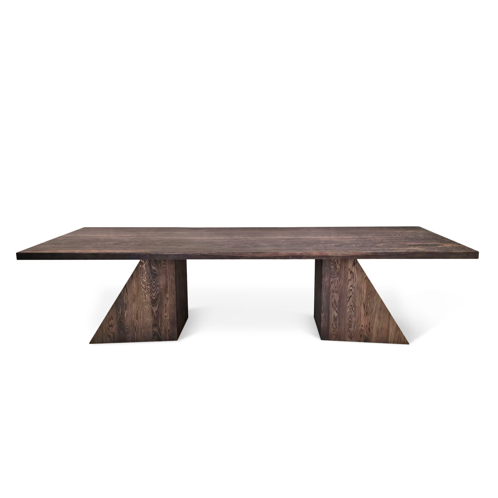 Neph bespoke dining table in chocolate oak, handcrafted from FSC certified solid wood planks. This premium, sustainable designer piece by Talia Haus features a minimalist top-view design, available in custom sizes and finishes including oak and walnut. A luxurious and extendable table that combines timeless style with eco-conscious craftsmanship.