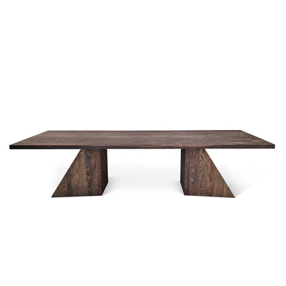 Neph bespoke dining table in chocolate oak, handcrafted from FSC certified solid wood planks. This premium, sustainable designer piece by Talia Haus features a minimalist top-view design, available in custom sizes and finishes including oak and walnut. A luxurious and extendable table that combines timeless style with eco-conscious craftsmanship.