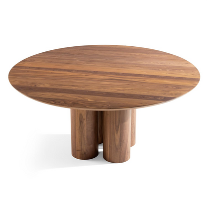 Ameline bespoke round dining table crafted from FSC certified solid walnut wood planks, featuring a minimalist designer style. This premium, sustainable piece by Talia Haus blends custom craftsmanship with luxury design, available in oak or walnut and extendable options for versatile dining spaces.