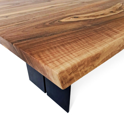 Bespoke, handcrafted solid walnut table with steel legs—sustainable, stable, and refined. Industrial elegance made to order in Europe.