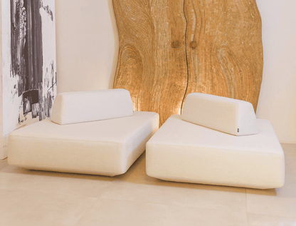 Deep-seated sectional sofa with minimalistic cushions – perfect for lounging.