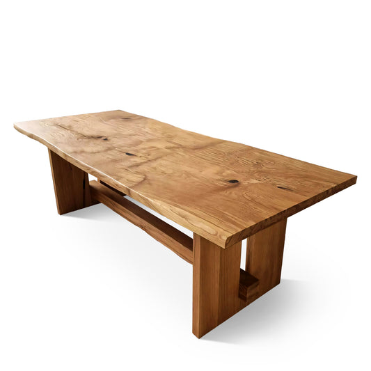 Corner view of Elsa bespoke rustic farmer-style dining table – custom extendable rectangular table handcrafted from FSC-certified solid oak or walnut wood planks with closed leg design, showcasing sustainable luxury and premium craftsmanship.

