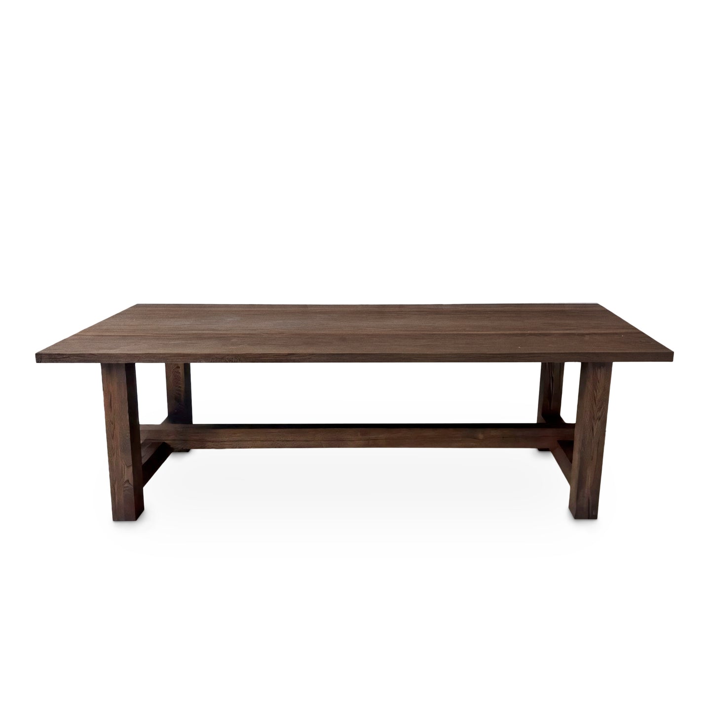 Detailed view of the Elsa rustic farmer-style dining table in rich chocolate oak, showcasing bespoke craftsmanship and FSC certified solid wood planks. This rectangular, extendable table by Talia Haus is a luxurious and sustainable piece, available in custom sizes and finishes including oak and walnut. A premium, handcrafted design perfect for elegant and timeless interiors.